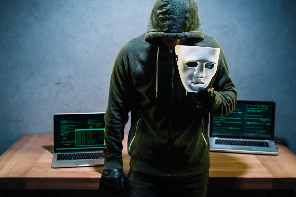 freepik_hacker_holding_mask25