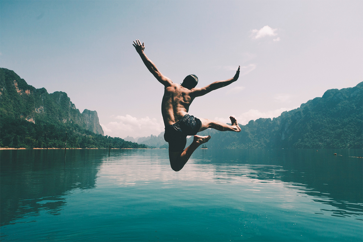 magnific_jumping_man_lake
